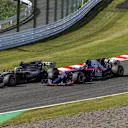 Romain Grosjean (FRA) Haas VF-17 and Pierre Gasly (FRA) Scuderia Toro Rosso STR12 battle at Formula One World Championship, Rd16, Japanese Grand Prix, Race, Suzuka, Japan, Sunday 8 October 2017. © Manuel Goria/Sutton Images