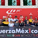 Drivers on the podium with #FuerzaMex1co sign at Formula One World Championship, Rd16, Japanese Grand Prix, Race, Suzuka, Japan, Sunday 8 October 2017. © Mark Sutton/Sutton Images