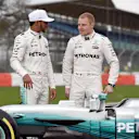 Lewis Hamilton (GBR) Mercedes AMG F1 and Valtteri Bottas (FIN) Mercedes AMG F1 with the new Mercedes-Benz F1 W08 Hybrid at Mercedes-Benz F1 W08 Hybrid Launch, Silverstone, England, 23 February 2017. © Sutton Images