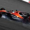 Fernando Alonso (ESP) McLaren MCL32 locks up at Formula One World Championship, Rd15, Malaysian Grand Prix, Practice, Sepang, Malaysia, Friday 29 September 2017. © Mark Sutton/Sutton Images