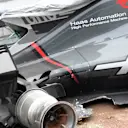 The crashed car of Romain Grosjean (FRA) Haas VF-17 is recovered in FP2 at Formula One World Championship, Rd15, Malaysian Grand Prix, Practice, Sepang, Malaysia, Friday 29 September 2017. © Rubio/Sutton Images