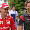 Sebastian Vettel (GER) Ferrari and Romain Grosjean (FRA) Haas F1 at Formula One World Championship, Rd15, Malaysian Grand Prix, Practice, Sepang, Malaysia, Friday 29 September 2017. © Kym Illman/Sutton Images