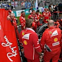 Ferrari mechanics observe the car of Kimi Raikkonen (FIN) Ferrari SF70-H with Turbo issues on the grid at Formula One World Championship, Rd15, Malaysian Grand Prix, Race, Sepang, Malaysia, Sunday 1 Octoberr 2017. © Mark Sutton/Sutton Images