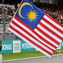 Grid girls with the Flag of Malaysia on the grid at Formula One World Championship, Rd15, Malaysian Grand Prix, Race, Sepang, Malaysia, Sunday 1 Octoberr 2017. © Mark Sutton/Sutton Images