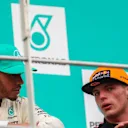 Lewis Hamilton (GBR) Mercedes AMG F1 and race winner Max Verstappen (NED) Red Bull Racing celebrate on the podium at Formula One World Championship, Rd15, Malaysian Grand Prix, Race, Sepang, Malaysia, Sunday 1 October 2017. © Kym Illman/Sutton Images