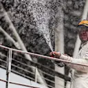 Lewis Hamilton (GBR) Mercedes AMG F1 celebrates on the podium with the champagne at Formula One World Championship, Rd15, Malaysian Grand Prix, Race, Sepang, Malaysia, Sunday 1 October 2017. © Kym Illman/Sutton Images