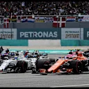 Stoffel Vandoorne (BEL) McLaren MCL32 battles with Felipe Massa (BRA) Williams FW40 at the start of the race at Formula One World Championship, Rd15, Malaysian Grand Prix, Race, Sepang, Malaysia, Sunday 1 October 2017. © Rubio/Sutton Images