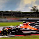 Fernando Alonso (ESP) McLaren MCL32 and Kevin Magnussen (DEN) Haas VF-17 battle at Formula One World Championship, Rd15, Malaysian Grand Prix, Race, Sepang, Malaysia, Sunday 1 October 2017. © Kym Illman/Sutton Images