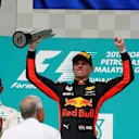 Race winner Max Verstappen (NED) Red Bull Racing celebrates on the podium at Formula One World Championship, Rd15, Malaysian Grand Prix, Race, Sepang, Malaysia, Sunday 1 Octoberr 2017. © Manuel Goria/Sutton Images