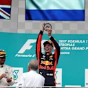 Lewis Hamilton (GBR) Mercedes AMG F1, race winner Max Verstappen (NED) Red Bull Racing and Daniel Ricciardo (AUS) Red Bull Racing celebrate on the podium at Formula One World Championship, Rd15, Malaysian Grand Prix, Race, Sepang, Malaysia, Sunday 1 Octoberr 2017. © Manuel Goria/Sutton Images