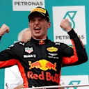 Race winner Max Verstappen (NED) Red Bull Racing celebrates on the podium at Formula One World Championship, Rd15, Malaysian Grand Prix, Race, Sepang, Malaysia, Sunday 1 Octoberr 2017. © Manuel Goria/Sutton Images