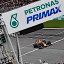Race winner Max Verstappen (NED) Red Bull Racing RB13 crosses the line and takes the chequered flag at Formula One World Championship, Rd15, Malaysian Grand Prix, Race, Sepang, Malaysia, Sunday 1 October 2017. © Mark Sutton/Sutton Images