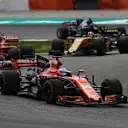 Fernando Alonso (ESP) McLaren MCL32 leads Sebastian Vettel (GER) Ferrari SF70-H at Formula One World Championship, Rd15, Malaysian Grand Prix, Race, Sepang, Malaysia, Sunday 1 October 2017. © Mark Sutton/Sutton Images