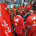 Ferrari attend to a problem on the car of Kimi Raikkonen (FIN) Ferrari SF70-H on the grid at Formula One World Championship, Rd15, Malaysian Grand Prix, Race, Sepang, Malaysia, Sunday 1 October 2017. © Mark Sutton/Sutton Images