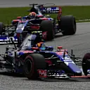 Carlos Sainz (ESP) Scuderia Toro Rosso STR12 leads Pierre Gasly (FRA) Scuderia Toro Rosso STR12 at Formula One World Championship, Rd15, Malaysian Grand Prix, Race, Sepang, Malaysia, Sunday 1 October 2017. © Mark Sutton/Sutton Images