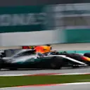 Daniel Ricciardo (AUS) Red Bull Racing RB13 and Valtteri Bottas (FIN) Mercedes-Benz F1 W08 Hybrid battle at Formula One World Championship, Rd15, Malaysian Grand Prix, Race, Sepang, Malaysia, Sunday 1 October 2017. © Mark Sutton/Sutton Images
