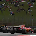 Sebastian Vettel (GER) Ferrari SF70-H and Nico Hulkenberg (GER) Renault Sport F1 Team RS17 battle at Formula One World Championship, Rd15, Malaysian Grand Prix, Race, Sepang, Malaysia, Sunday 1 October 2017. © Mark Sutton/Sutton Images