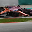 Stoffel Vandoorne (BEL) McLaren MCL32 and Sergio Perez (MEX) Force India VJM10 battle at Formula One World Championship, Rd15, Malaysian Grand Prix, Race, Sepang, Malaysia, Sunday 1 October 2017. © Mark Sutton/Sutton Images
