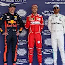 (L to R): Max Verstappen (NED) Red Bull Racing, pole sitter Sebastian Vettel (GER) Ferrari and Lewis Hamilton (GBR) Mercedes AMG F1 celebrate in parc ferme at Formula One World Championship, Rd18, Mexican Grand Prix, Qualifying, Circuit Hermanos Rodriguez