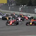Max Verstappen (NED) Red Bull Racing RB13 and Sebastian Vettel (GER) Ferrari SF70-H battle at the start of the race at Formula One World Championship, Rd18, Mexican Grand Prix, Race, Circuit Hermanos Rodriguez, Mexico City, Mexico, Sunday 29 October 2017.