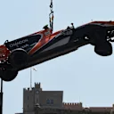 The crashed car of Stoffel Vandoorne (BEL) McLaren MCL32 is caraned away in Q2 at Formula One World Championship, Rd6, Monaco Grand Prix, Qualifying, Monte-Carlo, Monaco, Saturday 27 May 2017. © Sutton Images