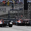 Stoffel Vandoorne (BEL) McLaren MCL32 walks crashed in Q2 and is passed by Jenson Button (GBR) McLaren MCL32 at Formula One World Championship, Rd6, Monaco Grand Prix, Qualifying, Monte-Carlo, Monaco, Saturday 27 May 2017. © Sutton Images