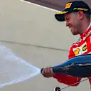 Race winner Sebastian Vettel (GER) Ferrari celebrates on the podium with the champagne at Formula One World Championship, Rd6, Monaco Grand Prix, Race, Monte-Carlo, Monaco, Sunday 28 May 2017. © Sutton Images
