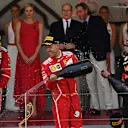 Kimi Raikkonen (FIN) Ferrari, race winner Sebastian Vettel (GER) Ferrari and Daniel Ricciardo (AUS) Red Bull Racing celebrate on the podium with the champagne at Formula One World Championship, Rd6, Monaco Grand Prix, Race, Monte-Carlo, Monaco, Sunday 28 May 2017. © Sutton Images
