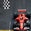Race winner Sebastian Vettel (GER) Ferrari SF70-H taks the chequered flag at Formula One World Championship, Rd6, Monaco Grand Prix, Race, Monte-Carlo, Monaco, Sunday 28 May 2017. © Sutton Images