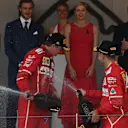 Race winner Sebastian Vettel (GER) Ferrari and Kimi Raikkonen (FIN) Ferrari celebrate on the podium with the champagne at Formula One World Championship, Rd6, Monaco Grand Prix, Race, Monte-Carlo, Monaco, Sunday 28 May 2017. © Sutton Images