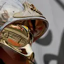 Sebastian Vettel (GER) Ferrari SF70-H reflected in a fire marshals helmet at Formula One World Championship, Rd6, Monaco Grand Prix, Practice, Monte-Carlo, Monaco, Thursday 25 May 2017. © Sutton Images