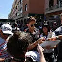 Romain Grosjean (FRA) Haas F1 signs autographs for the fans at Formula One World Championship, Rd6, Monaco Grand Prix, Preparations, Monte-Carlo, Monaco, Wednesday 24 May 2017. © Sutton Images