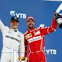 Race winner Valtteri Bottas (FIN) Mercedes AMG F1 and Sebastian Vettel (GER) Ferrari celebrate on the podium with the trophies at Formula One World Championship, Rd4, Russian Grand Prix, Race, Sochi Autodrom, Sochi, Krasnodar Krai, Russia, Sunday 30 April 2017. © Sutton Motorsport Images