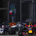 Max Verstappen (NED) Red Bull Racing RB13 and Kevin Magnussen (DEN) Haas VF-17 at Formula One World Championship, Rd14, Singapore Grand Prix, Qualifying, Marina Bay Street Circuit, Singapore, Saturday 16 September 2017. © Sutton Images