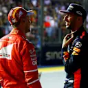 Pole sitter Sebastian Vettel (GER) Ferrari and Daniel Ricciardo (AUS) Red Bull Racing in parc ferme at Formula One World Championship, Rd14, Singapore Grand Prix, Qualifying, Marina Bay Street Circuit, Singapore, Saturday 16 September 2017. © Sutton Images