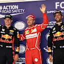 (L to R): Max Verstappen (NED) Red Bull Racing, pole sitter Sebastian Vettel (GER) Ferrari and Daniel Ricciardo (AUS) Red Bull Racing celebrate in parc ferme at Formula One World Championship, Rd14, Singapore Grand Prix, Qualifying, Marina Bay Street Circuit, Singapore, Saturday 16 September 2017. © Sutton Images