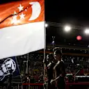 National Anthem is observed with Flag of Singapore on the grid at Formula One World Championship, Rd14, Singapore Grand Prix, Race, Marina Bay Street Circuit, Singapore, Sunday 17 September 2017. © Manuel Goria/Sutton Images