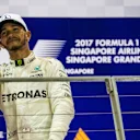 Race winner Lewis Hamilton (GBR) Mercedes AMG F1 Celebrates on the podium at Formula One World Championship, Rd14, Singapore Grand Prix, Race, Marina Bay Street Circuit, Singapore, Sunday 17 September 2017. © Manuel Goria/Sutton Images
