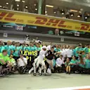 Race winner Lewis Hamilton (GBR) Mercedes AMG F1 celebrates with Valtteri Bottas (FIN) Mercedes AMG F1 and the team at Formula One World Championship, Rd14, Singapore Grand Prix, Race, Marina Bay Street Circuit, Singapore, Sunday 17 September 2017. © Mirko Stange/Sutton Images