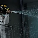 Race winner Lewis Hamilton (GBR) Mercedes AMG F1 celebrates on the podium with the champagne at Formula One World Championship, Rd14, Singapore Grand Prix, Race, Marina Bay Street Circuit, Singapore, Sunday 17 September 2017. © Kym Illman/Sutton Images