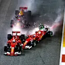 Sebastian Vettel (GER) Ferrari SF70-H, Max Verstappen (NED) Red Bull Racing RB13 and Kimi Raikkonen (FIN) Ferrari SF70-H crash at the start of the race at Formula One World Championship, Rd14, Singapore Grand Prix, Race, Marina Bay Street Circuit, Singapore, Sunday 17 September 2017. © Kym Illman/Sutton Images