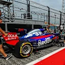Scuderia Toro Rosso STR12 pushed by Scuderia Toro Rosso mechanics at Formula One World Championship, Rd13, Italian Grand Prix, Preparations, Monza, Italy, Thursday 31 August 2017. © Sutton Images