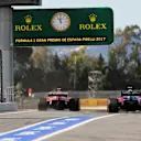 Carlos Sainz (ESP) Scuderia Toro Rosso STR12 and Kimi Raikkonen (FIN) Ferrari SF70-H at Formula One World Championship, Rd5, Spanish Grand Prix, Qualifying, Barcelona, Spain, Saturday 13 May 2017. © Sutton Motorsport Images