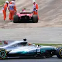 Lewis Hamilton (GBR) Mercedes-Benz F1 W08 Hybrid passes race retiree Kimi Raikkonen (FIN) Ferrari SF70-H at Formula One World Championship, Rd5, Spanish Grand Prix, Race, Barcelona, Spain, Sunday 14 May 2017. © Sutton Motorsport Images