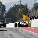 Sebastian Vettel (GER) Ferrari SF70-H, Valtteri Bottas (FIN) Mercedes-Benz F1 W08 Hybrid and marshal with yellow flag at Formula One Testing, Day Three, Barcelona, Spain, 1 March 2017. © Sutton Images