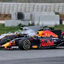 Max Verstappen (NED) Red Bull Racing RB13 and Sergio Perez (MEX) Force India VJM10 at Formula One Testing, Day Two, Barcelona, Spain, 8 March 2017. © Sutton Images