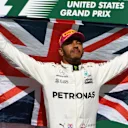 Race winner Lewis Hamilton (GBR) Mercedes AMG F1 celebrates on the podium with the Union flag at Formula One World Championship, Rd17, United States Grand Prix, Race, Circuit of the Americas, Austin, Texas, USA, Sunday 22 October 2017. © Mark Sutton/Sutton Images