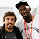 Fernando Alonso (ESP) McLaren and Usain Bolt (USA) at Formula One World Championship, Rd17, United States Grand Prix, Race, Circuit of the Americas, Austin, Texas, USA, Sunday 22 October 2017. © Steven Tee/LAT/Sutton Images