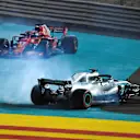 Lewis Hamilton, Mercedes-AMG F1 W09 EQ Power+ and Sebastian Vettel, Ferrari SF71H celebrate with donuts at the end of the race at Formula One World Championship, Rd21, Abu Dhabi Grand Prix, Race, Yas Marina Circuit, Abu Dhabi, UAE, Sunday 25 November 2018.