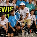 Lewis Hamilton, Mercedes AMG F1 celebrates with the team at Formula One World Championship, Rd21, Abu Dhabi Grand Prix, Race, Yas Marina Circuit, Abu Dhabi, UAE, Sunday 25 November 2018.